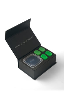 JAWZ box open showing the green jawline exercisers